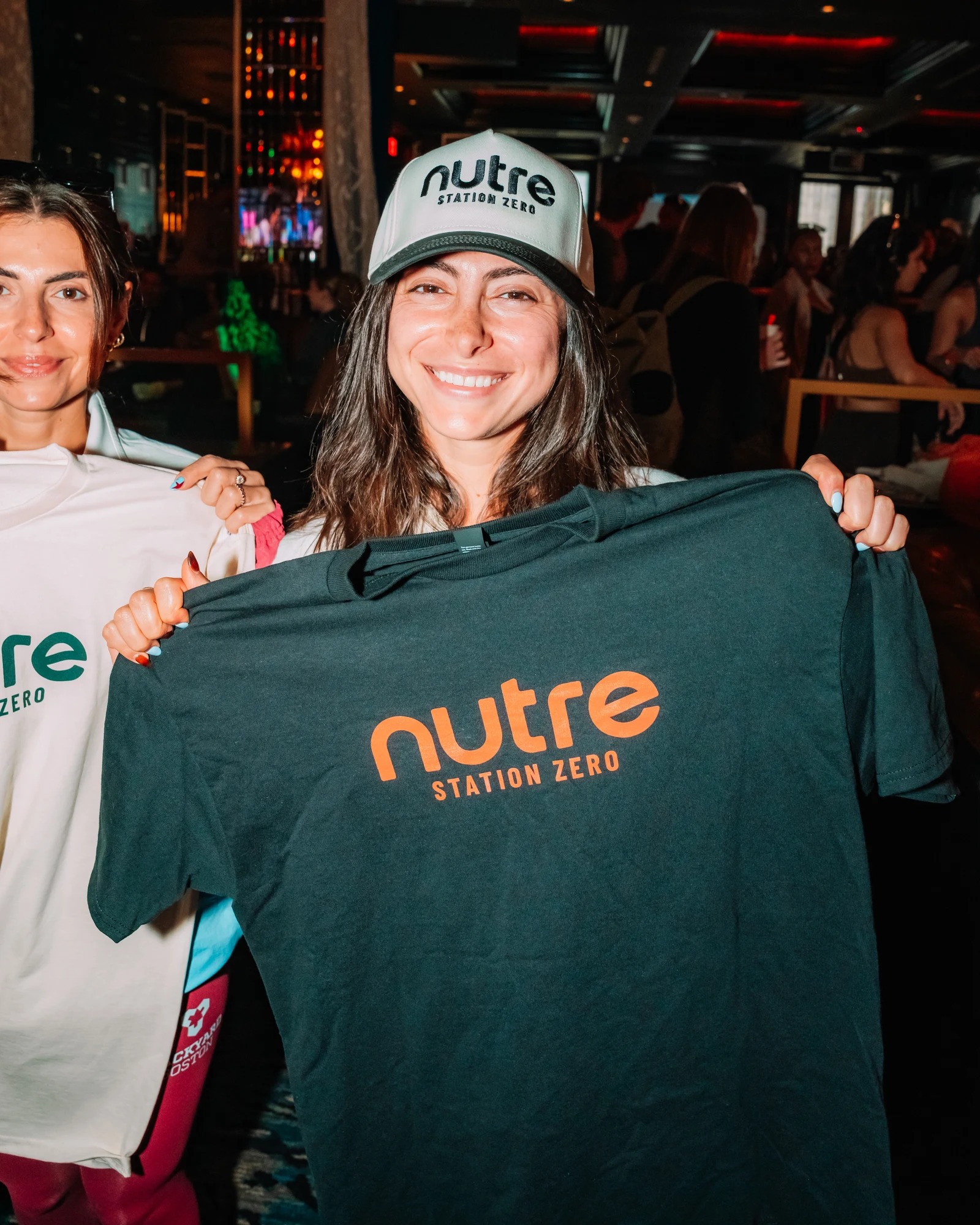 Nutre wordmark across the chest.